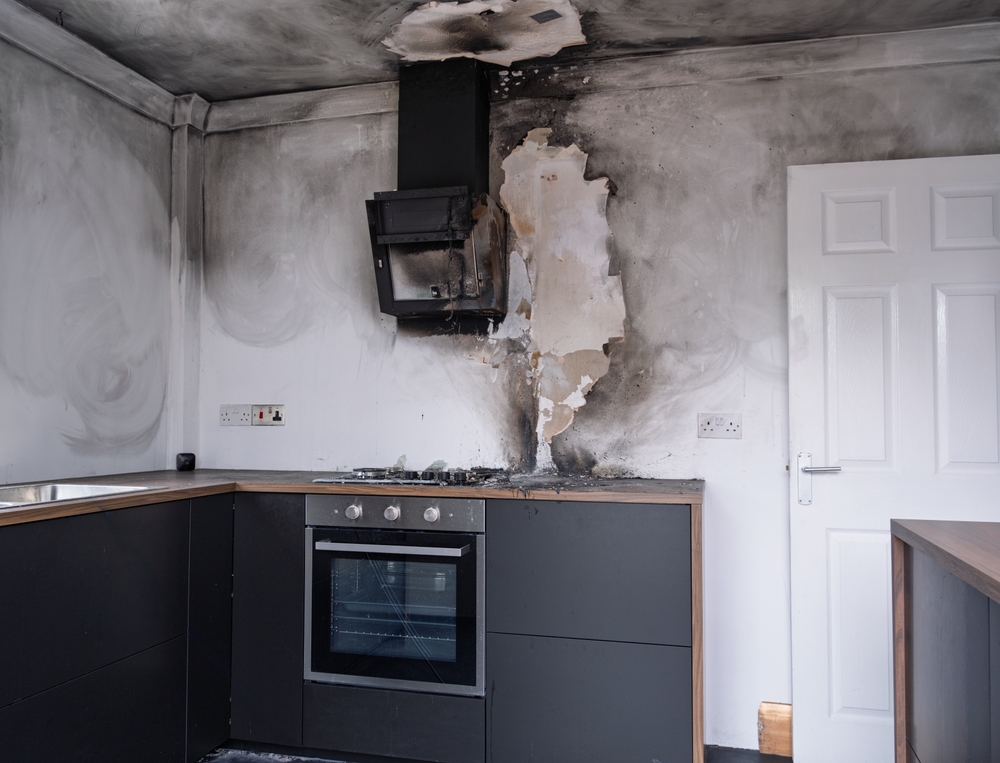 Fire damaged kitchen representing fire damage insurance claim in Brooklyn