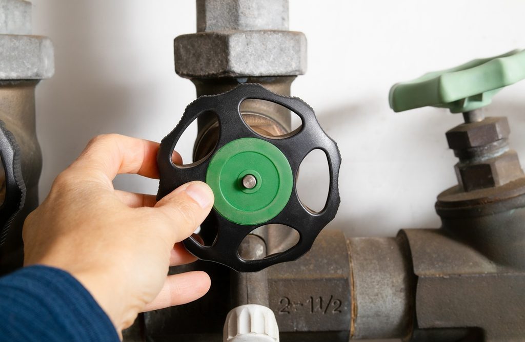 Water shutoff valve representing emergency response for sewage backup insurance claim in New York